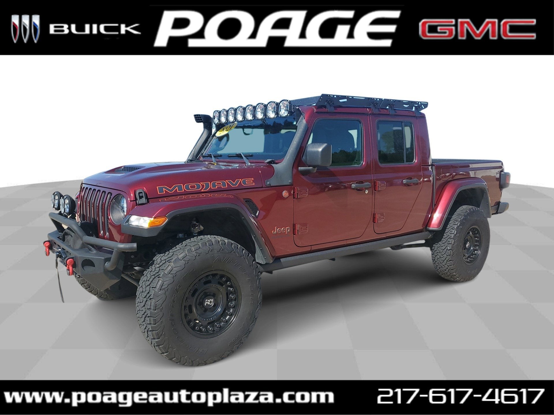 2021 Jeep Gladiator Mojave in Maroon — front three-quarter view